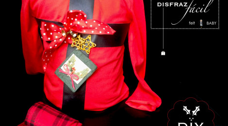 Disfraz infantil terminado en tonos rojos navideños